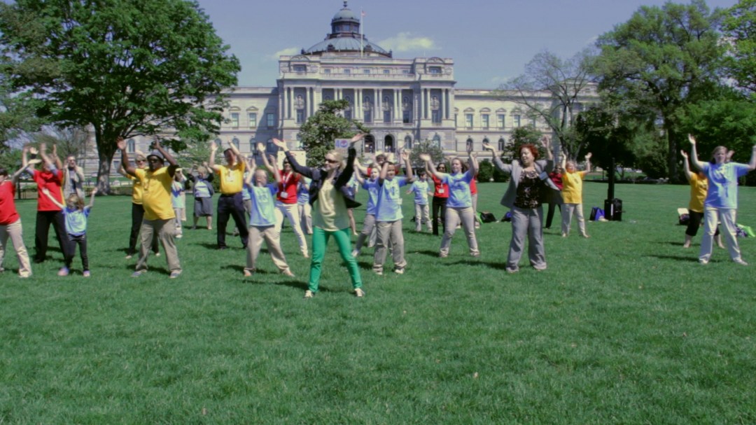Close to 50 library advances do the NLLD "Happy" Dance in front of the US Capitol and Library of Congress